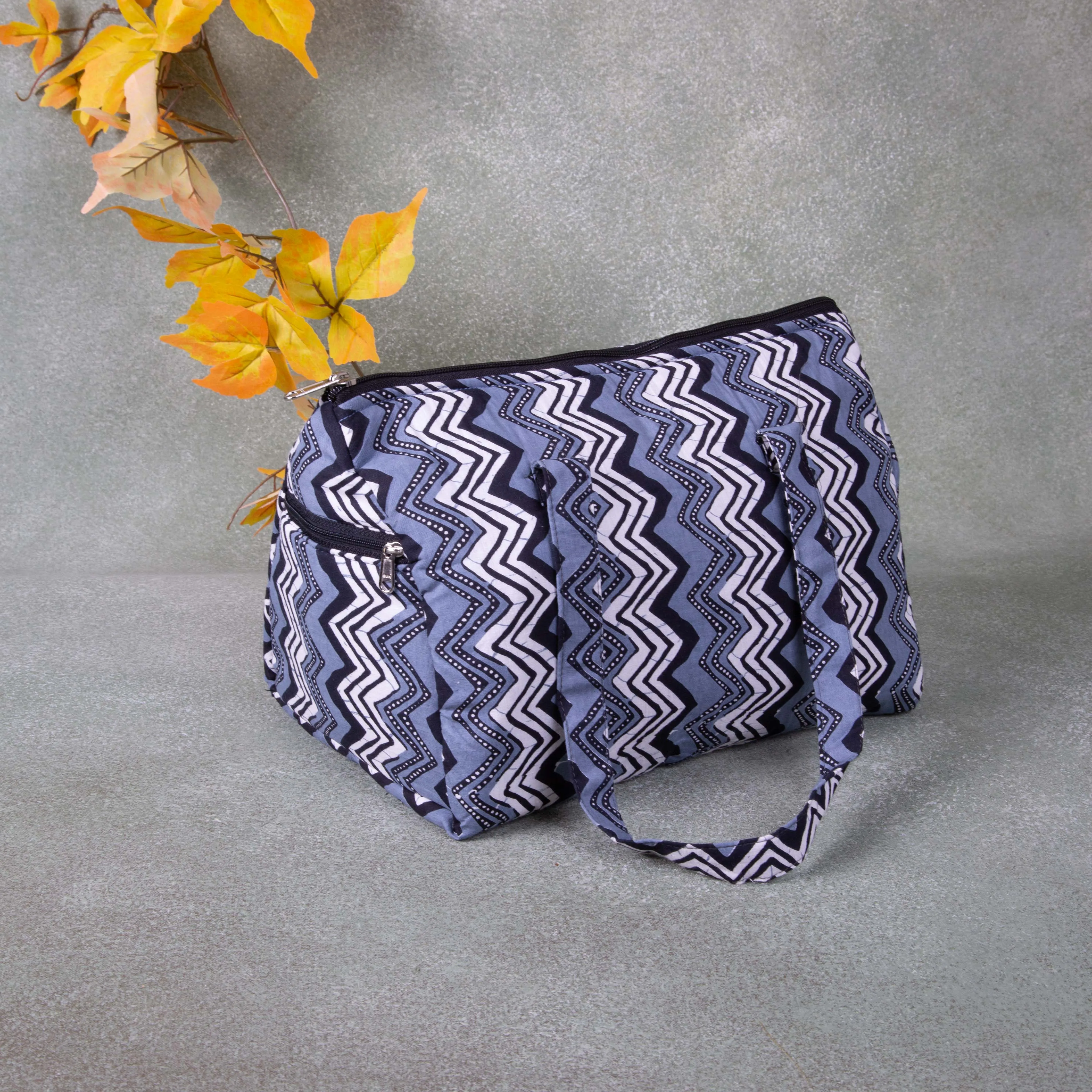 Barrel Handbags Grey With Black Zig Zag Design.